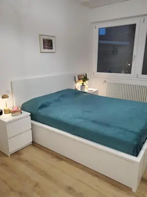 Letto o letti in una camera di A Happy Home!