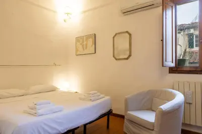 Letto o letti in una camera di Romana Living