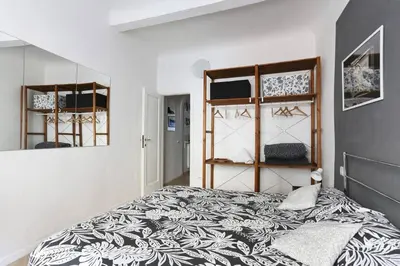 Letto o letti in una camera di Taddea Urban Market
