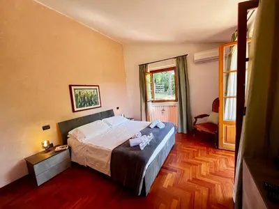 Letto o letti in una camera di Villa Jolie by Holiday World