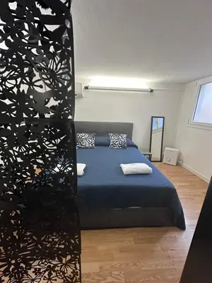 Letto o letti in una camera di Florence Sweet Nest