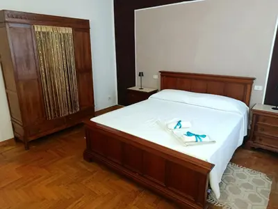 Letto o letti in una camera di Camera Emma