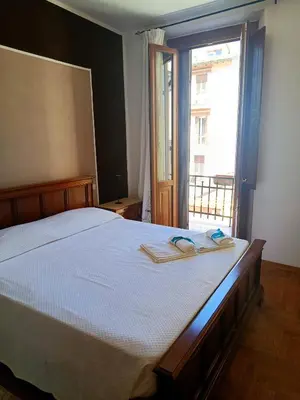 Letto o letti in una camera di Camera Emma