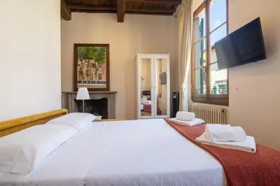 Letto o letti in una camera di San Frediano Central Studio