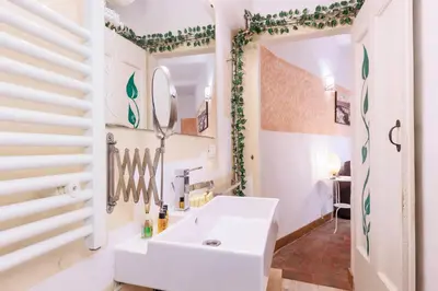 Letto o letti in una camera di Cozy House in Pepi Street