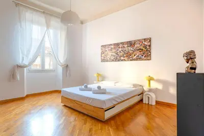 Letto o letti in una camera di Appartamento di design in Via Gioberti
