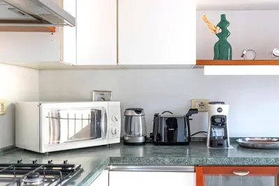 Cucina o angolo cottura di Appartamento di design in Via Gioberti