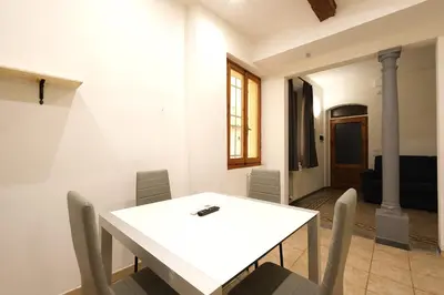 Area soggiorno di Wine Apartments Florence Sagrantino
