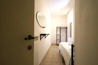 Letto o letti in una camera di Wine Apartments Florence Sagrantino