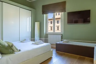 Letto o letti in una camera di Romantic Florence City Center Suite