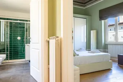 Letto o letti in una camera di Romantic Florence City Center Suite