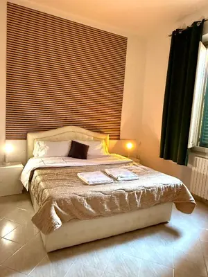 Letto o letti in una camera di Villa Caterina