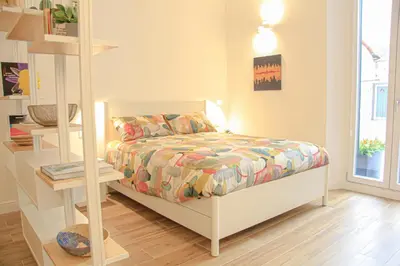 Letto o letti in una camera di La Dolce Vita Heart of Florence