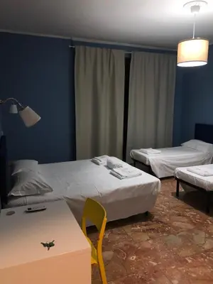 Letto o letti in una camera di Affittacamere Novoli