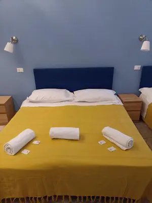 Letto o letti in una camera di Affittacamere Novoli