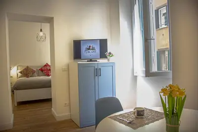 Letto o letti in una camera di Dal Pittore Heart of Florence