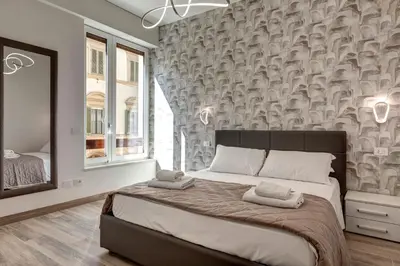 Letto o letti in una camera di Landino Apartment by Mamo Florence