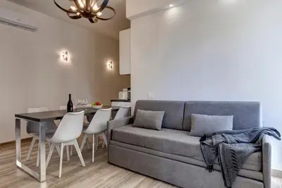 Area soggiorno di Landino Apartment by Mamo Florence