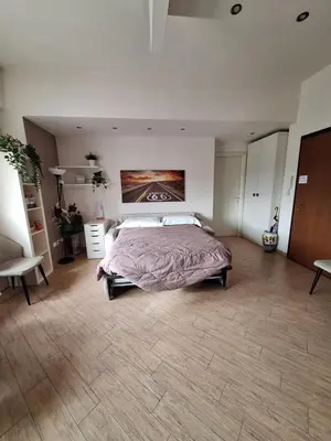 Letto o letti in una camera di Le Petit Maison