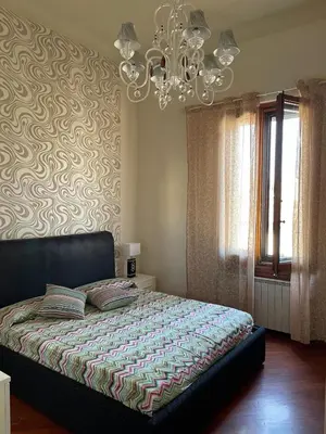 Letto o letti in una camera di Serena House