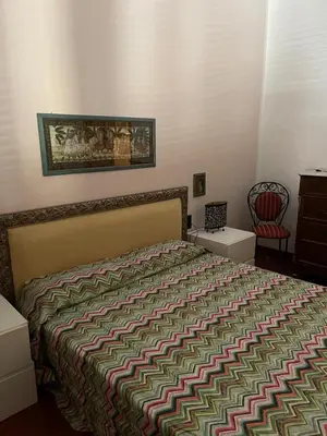 Letto o letti in una camera di Serena House