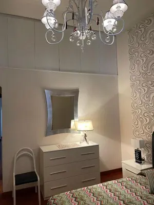 Letto o letti in una camera di Serena House