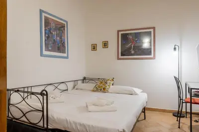 Letto o letti in una camera di Ghibellina Living