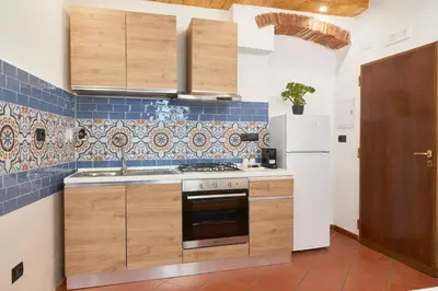 Cucina o angolo cottura di Goldoni Sweet Apartment in Santo Spirito