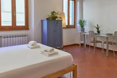 Letto o letti in una camera di Goldoni Sweet Apartment in Santo Spirito