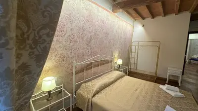 Letto o letti in una camera di San Giovanni 42