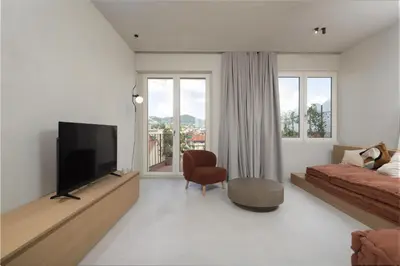 TV o dispositivi per l'intrattenimento presso Modern Apartment with Skyline Views