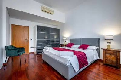 Letto o letti in una camera di YD Florentine Charm & Comfort