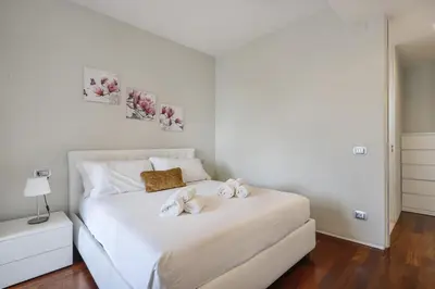Letto o letti in una camera di Modern Penthouse with Terrace and Parking