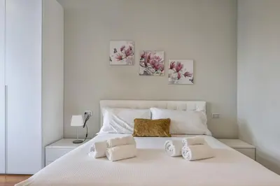Letto o letti in una camera di Modern Penthouse with Terrace and Parking