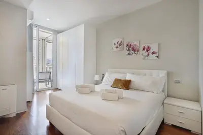 Letto o letti in una camera di Modern Penthouse with Terrace and Parking