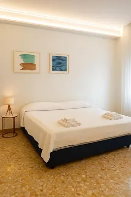 Letto o letti in una camera di Casa Fiore