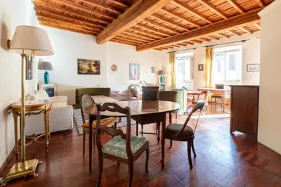 Area soggiorno di Camere con bagno privato in APT condiviso Palazzo Pitti
