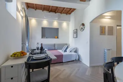 Letto o letti in una camera di Bijoux Suite near Boboli Gardens