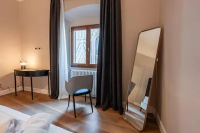 Letto o letti in una camera di Florence Dome Rooms