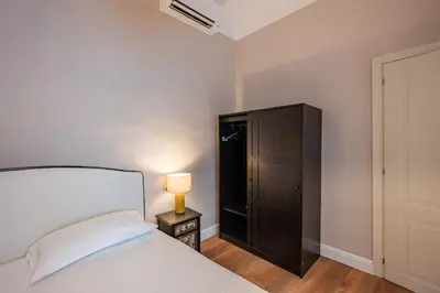 Letto o letti in una camera di Florence Dome Rooms