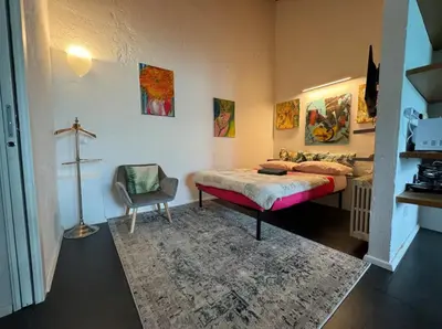 Letto o letti in una camera di Cozy apartment in Oltrarno area