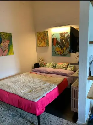 Letto o letti in una camera di Cozy apartment in Oltrarno area