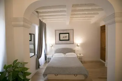 Letto o letti in una camera di Cestello Luxury Rooms