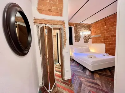 Letto o letti in una camera di Tuscan charm in San Frediano