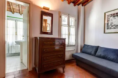 Area soggiorno di Farinata Apartment by Mamo Florence