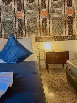 Letto o letti in una camera di Appartamento toscano accogliente il Bassorilievo