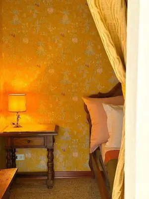 Letto o letti in una camera di Appartamento toscano accogliente il Bassorilievo