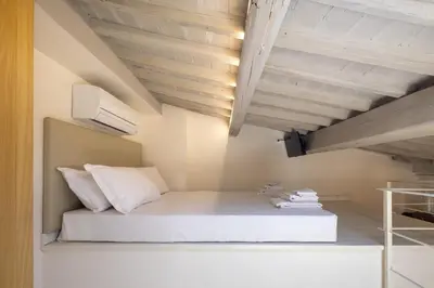 Letto o letti in una camera di Charming & Spacious Florence Apartment