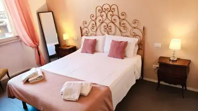 Letto o letti in una camera di Nonna Ines