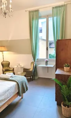 Letto o letti in una camera di Nonna Ines